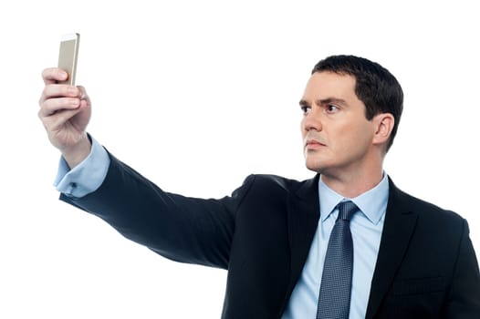Businessman clicking his own picture
