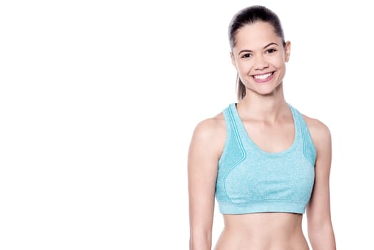 Charming young woman in sportswear