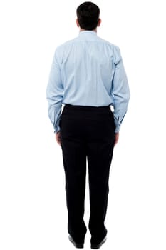 Male employee facing the wall