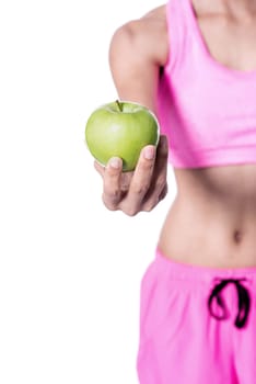 Cropped image of woman showing green apple