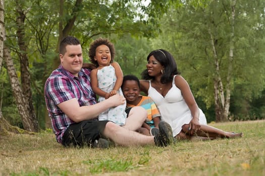 African family is having fun on the grass