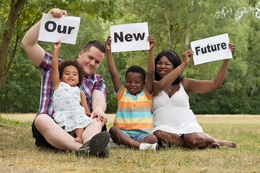 African multicultural family is holding white boards