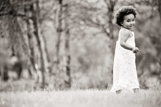 African young girl is having fun outside