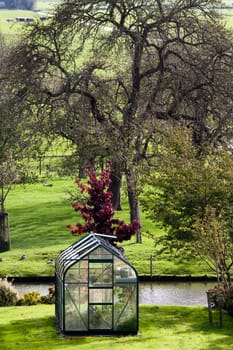 Idyllic greenhouse in the garden