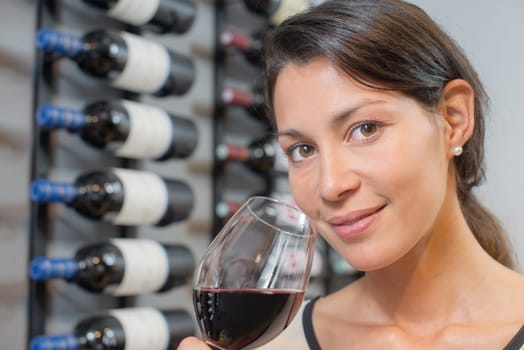 Woman tasting some wine
