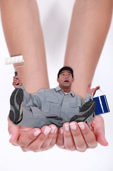 Man falling in hands of a woman
