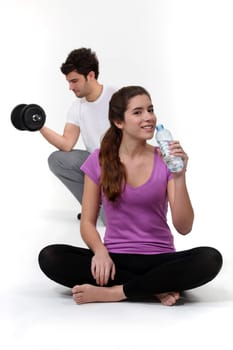 Young couple working out.
