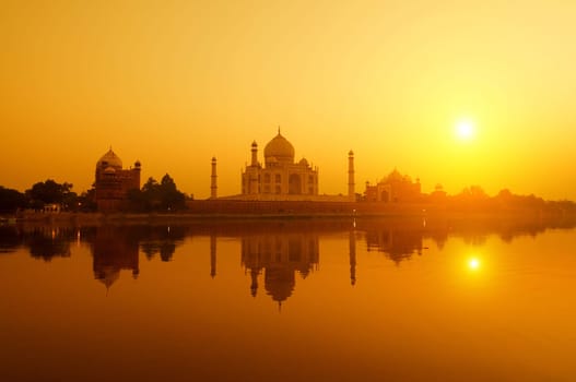 Panoramic view of Taj Mahal at sunset with reflection, Agra, Uttar Pradesh, India.