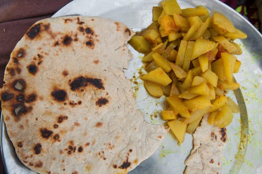 Indian street food, chapati and curry vegetable