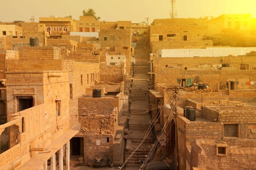 Jaisalmer city view, ancient brick houses in the sunset.