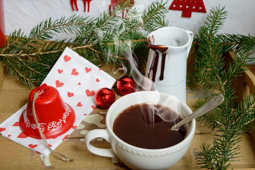 cup of chocolate with a Christmas decoration