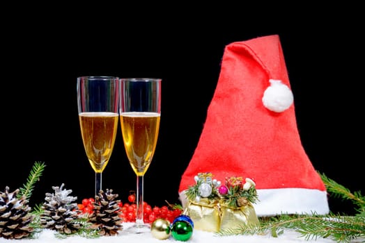 Christmas decoration with two glasses of champagne,Santa Claus hat
