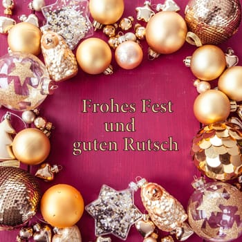 Various golden Christmas tree baubles as a festive background for Christmas