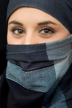 young woman with a veil, close up portrait, studio picture