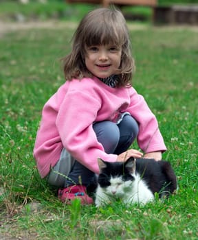 Child stalivates cat