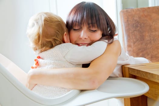 Baby and mother embrace