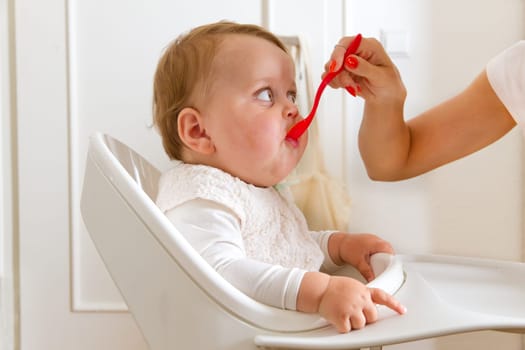 Mother feeding her baby