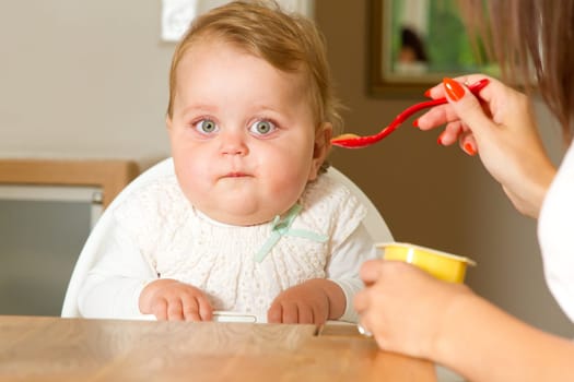Mom feeds her baby