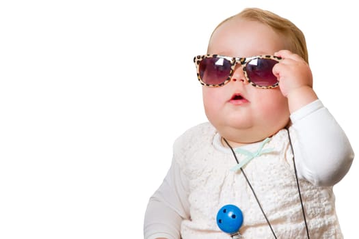 Baby with sunglasses,exposed on white background
