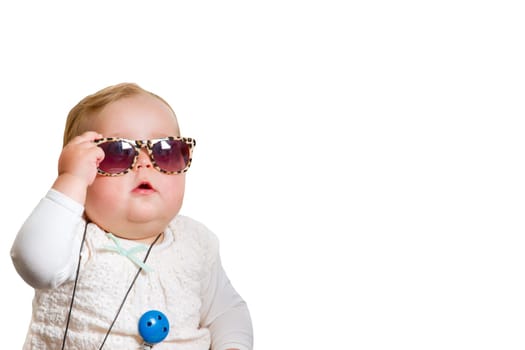 Baby with sunglasses,exposed on white background
