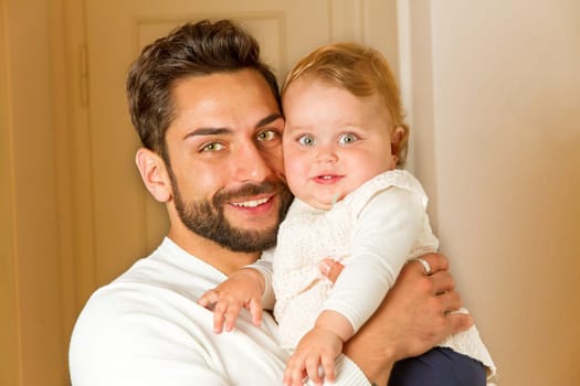 Father with child on his arm
