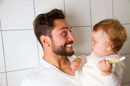 Dad shows off his freshly brushed teeth