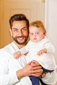 Father with child on his arm