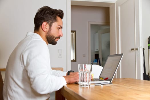 Young man in the home office