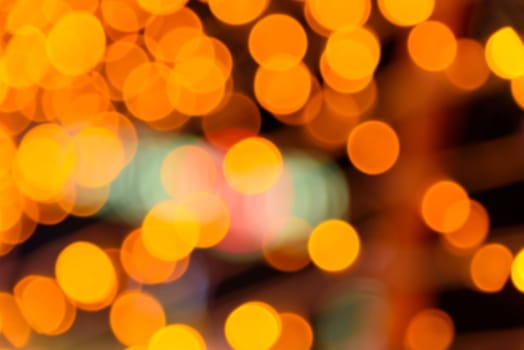 Abstract circular natural orange and yellow light bokeh background