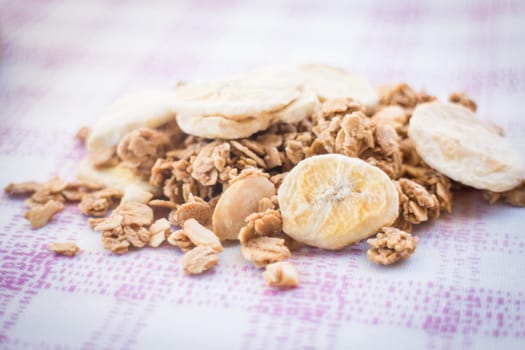 Homemade granola breakfast with dried fruit, stock photo