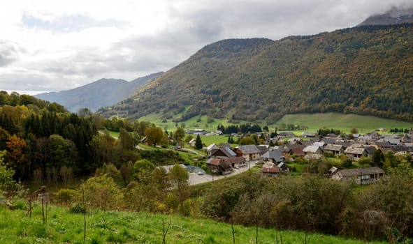 small mountain village of Savoie under a cloudy sky