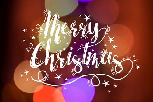 Merry christmas calligraphy with stars on bokeh light background. Ideal for xmas greeting card, holiday poster or web.
