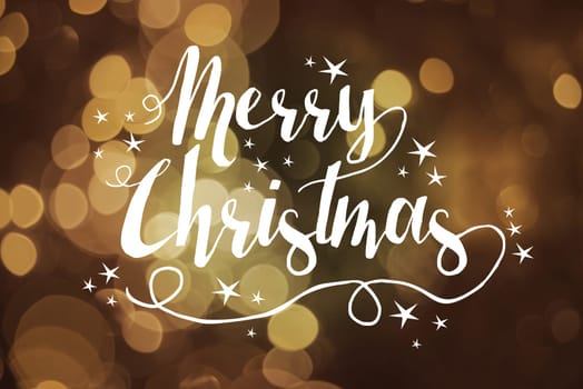 Merry christmas greeting card bokeh light golden sepia effect background with xmas text and stars. Ideal for holiday season.   .