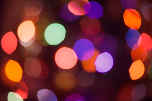 Retro blur lights, colorful disco background with bokeh effect. Ideal for party invitation, event, holiday greeting card or web backdrop.