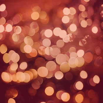 Defocused vintage light blur background with bokeh style effect. Ideal for holiday greeting card, event invitation or web backdrop..
