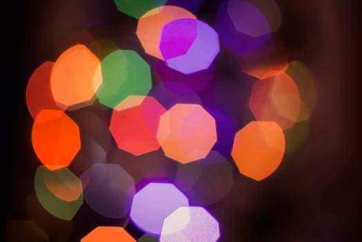 Blur light abstract background, defocused color lighting with bokeh effect. Ideal for holiday greeting card, event invitation or web backdrop.