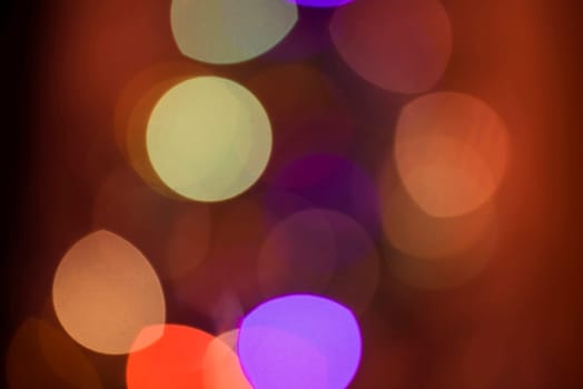 Defocused light blur background with bokeh style effect. Ideal for holiday greeting card, event invitation