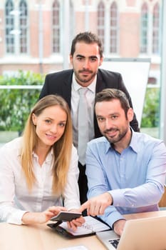 View of a Group of business people working together at the office