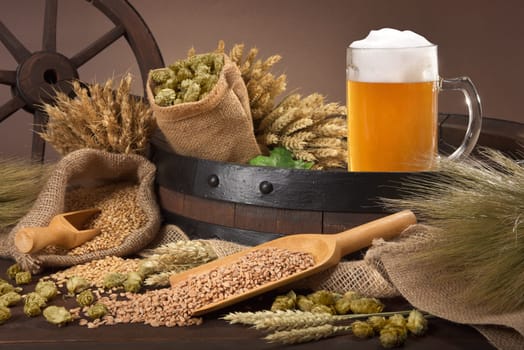 Beer barrel,beer jug with wheat,barley,hops and malt