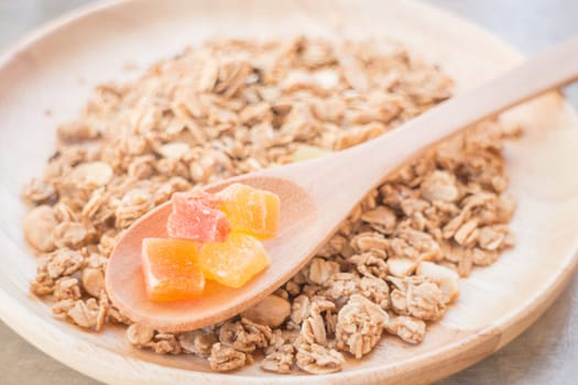 Homemade granola breakfast with dried fruit, stock photo