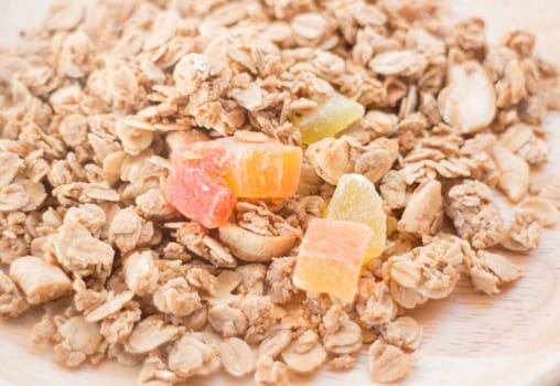 Homemade granola breakfast with dried fruit, stock photo