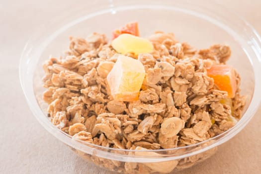 Homemade granola breakfast with dried fruit, stock photo