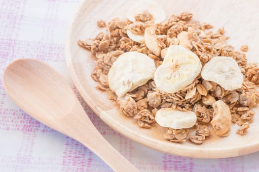 Homemade granola breakfast with dried fruit, stock photo