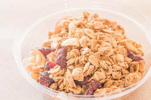 Homemade granola breakfast with dried fruit, stock photo