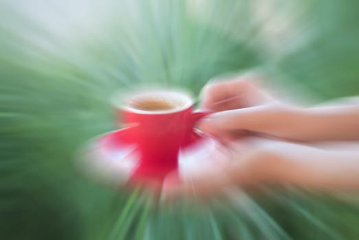 Woman serve red cup of coffee, stock photo
