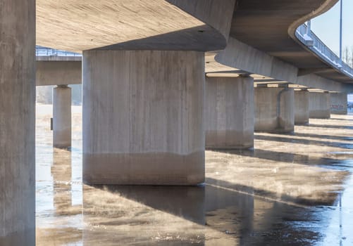 Mist on Icy River under Bridge in Umea, Sweden