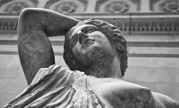 Marble statue of a wounded Amazon. Black and white shot