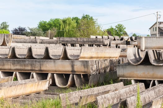 Stack of prefabricated concrete for the construction of irrigation channels for agriculture.