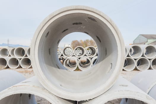Concrete drainage pipes for industrial building construction.