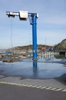 a big crane to lift the boat from the water
